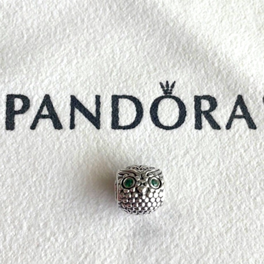 A Pandora Sterling Silver Wise Owl Green CZ Charm.